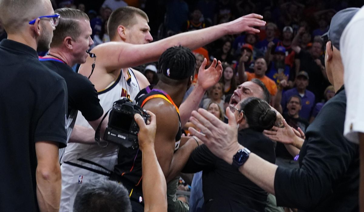 Denver's Nikola Jokic shoves Phoenix Suns' owner during courtside tussle