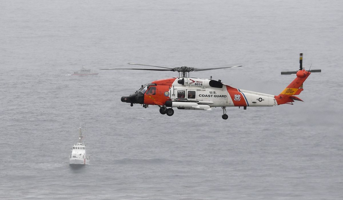 Coast Guard helicopter on search and rescue mission crashes on Alaska island